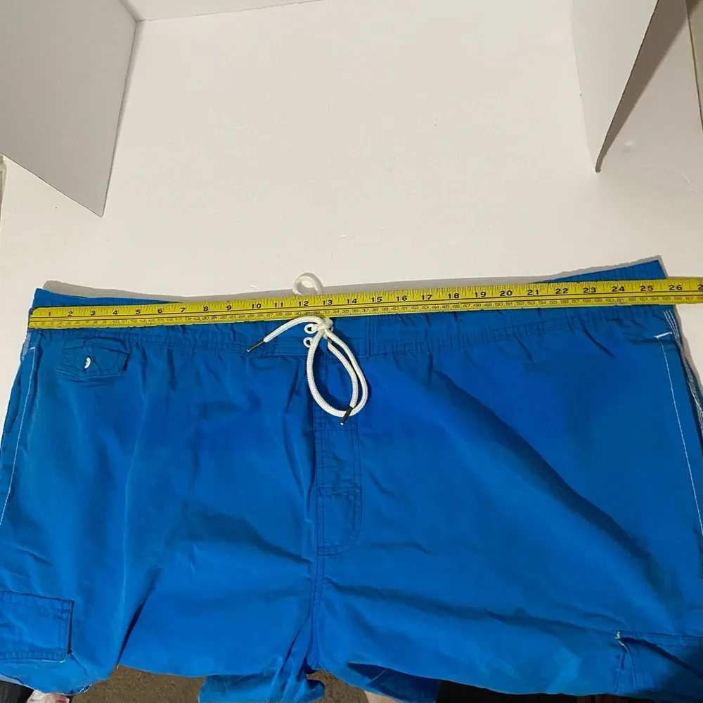 Men’s The Foundry Supply Co blue with green swim trunks. 3XL